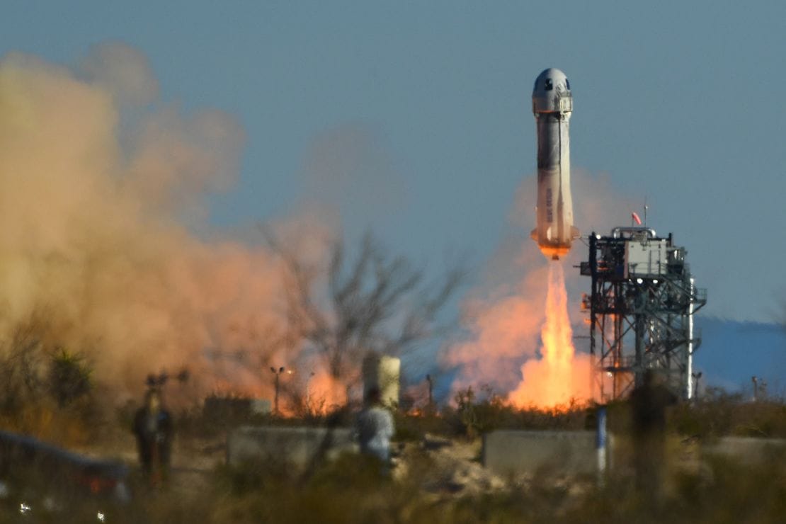 A Blue Origin New Shepard rocket lifts off from the company's launch site in West Texas on March 31, 2022. The mission carried five paying passengers and Gary Lai, New Shepard's chief architect, into space.